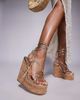 SIMMI Shoes Simmi London Jadey strappy high heeled wedges in gold - 1