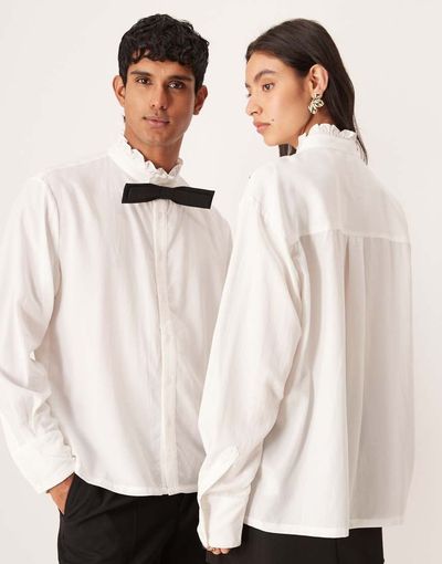 sister jane Sister Jane Unisex Duke ruffle collar long sleeve shirt in white with contrast black bow tie