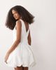 Six Stories Six Stories Bridal faux-pearl trim bubble hem mini dress in white - 4