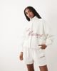 Six Stories Six Stories 'Just Married' jersey high neck zip up sweater in white - part of a set - 1