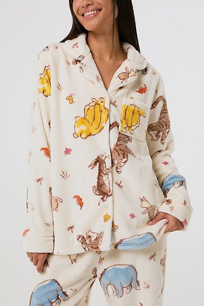 Skinnydip London Skinnydip London Disney Winnie The Pooh Fleece Pyjama Set Top in Cream, Women's at Urban Outfitters