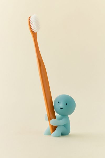 Smiski® Smiski Glow-In-The-Dark Toothbrush Stand in Green at Urban Outfitters