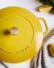 Staub Staub Cast Iron 5-qt Essential Dutch Oven in Citron at Urban Outfitters - 1