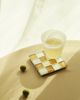 Subtle Art Studios Subtle Art Studios Chocolate Checkered Glass Tile Coaster in Hazelnut Milk Chocolate at Urban Outfitters - 1