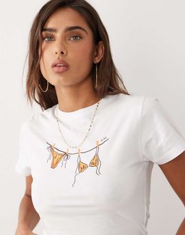The Frolic The Frolic exclusive bikini graphic front baby tee in white