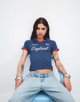 The Frolic The Frolic Exclusive cotton-rich England script soccer baby tee in navy