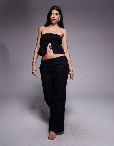 The Frolic The Frolic exclusive cotton rich cheesecloth broderie tie waist wide leg beach pants in black - part of a set