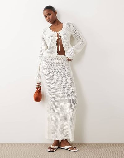 The Frolic The Frolic exclusive cotton rich open crochet scallop edge tie front maxi beach skirt in cream - part of a set-White