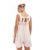 The Frolic The Frolic exclusive cotton square neck lace trim bow embroidered tie back floaty romper in light pink - 2