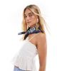 The Frolic The Frolic exclusive ruffle trim tie back babydoll cami top in white - 1
