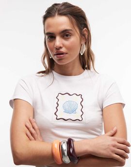 The Frolic The Frolic exclusive shell graphic front baby tee in white