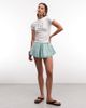 The Frolic The Frolic exclusive shell graphic front baby tee in white - 3