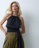 The Frolic The Frolic halter neck low back drape detail top in black - 1