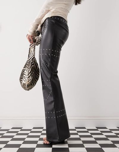 The Kript The Kript low rise leather pants with studs in black
