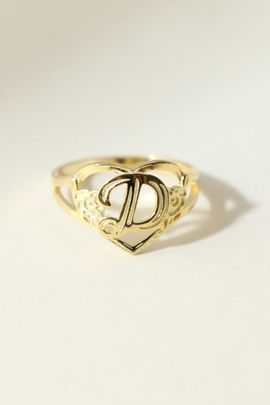 The M Jewelers The M Jewelers Gold Cutout Flower Heart Letter Ring, Women's at Urban Outfitters