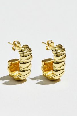 The M Jewelers The M Jewelers Margaux Huggie Hoops in Gold, Women's at Urban Outfitters