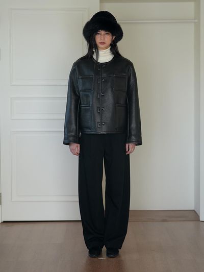 The milui Vegan Leather Round Neck Short Jacket [Black]