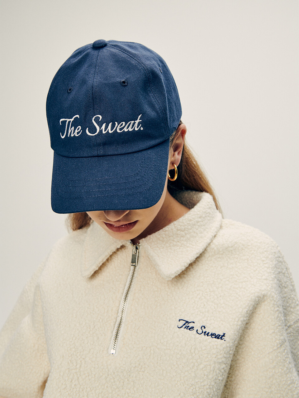 The Sweat. Cursive Logo Cap - NAVY