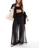 Threadbare Threadbare sheer wide leg beach pants with side slit in black - 1