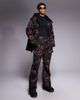 Threadbare Threadbare ski pants in black and orange print - 1