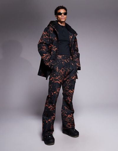 Threadbare Threadbare ski pants in black and orange print