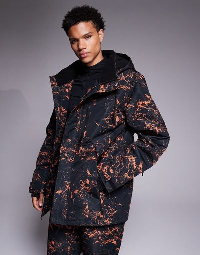 Threadbare Threadbare zip through ski jacket with hood in black and orange print