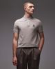 Tommy Hilfiger Tommy Hilfiger crest logo polo shirt in beige-Neutral - 1
