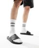Tommy Hilfiger Tommy Hilfiger raised logo pool slides in black - 1