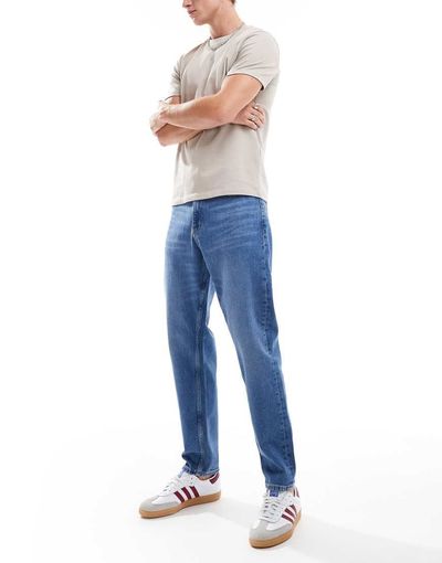 Tommy Jeans Tommy Jeans Isaac relaxed tapered jeans in mid wash-Blue