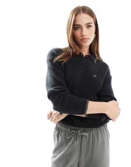 Tommy Jeans Tommy Jeans polo sweater in black with glitter details