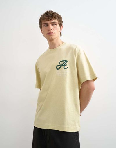 Topman Topman relaxed fit T-shirt with Amor embroidery in washed yellow-Neutral
