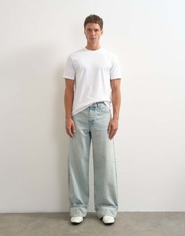 Topman Topman rigid baggy fit jeans with turn-up hem in light wash-Blue
