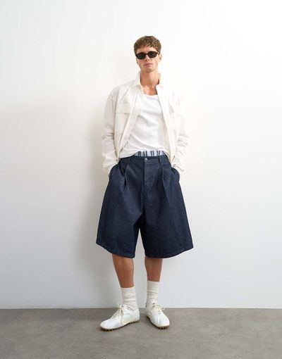 Topman Topman wide leg denim bermuda shorts with pronounced pleat in raw-Blue