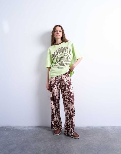 Topshop Topshop abstract animal print plisse pants in brown