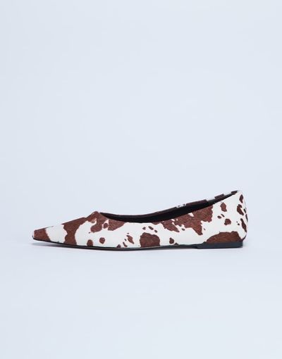 Topshop Topshop Ace point toe flat shoes in cow print hair in real leather-Black