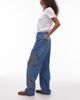 Topshop Topshop Column mid rise jeans with cutwork details in mid blue - 3