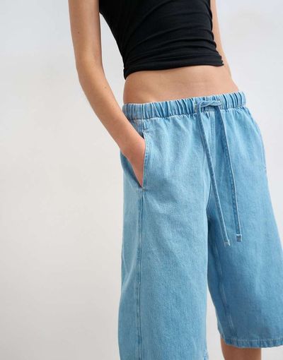 Topshop Topshop denim pull on barrel shorts in bleach-Blue