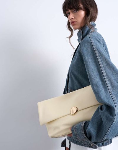 Topshop Topshop Gaia folded clutch purse with hardware detail in off white-Yellow
