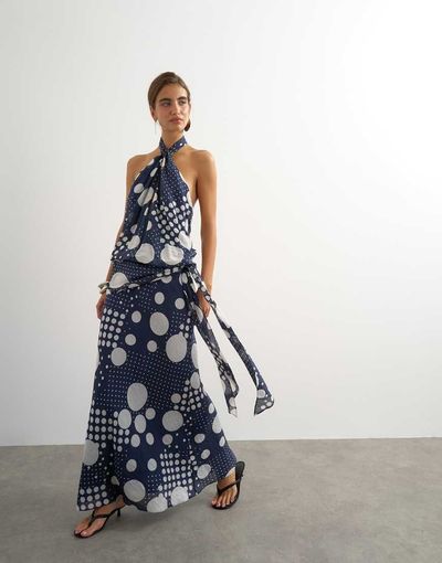 Topshop Topshop halterneck dropped waist tie detail maxi dress in navy mixed dot-Black
