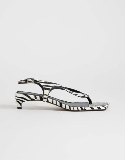 Topshop Topshop Sunshine mid-height heel flip flops in zebra hair-on real leather-Black