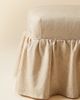 TOV Furniture TOV Furniture Gertrude Skirted Linen Upholstered Ottoman in Yellow at Urban Outfitters - 2