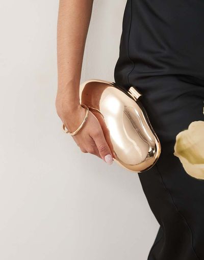 True Decadence True Decadence metallic hard clutch bag with detachable crossbody strap in gold