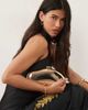 True Decadence True Decadence metallic hard clutch bag with detachable crossbody strap in gold - 3