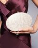 True Decadence True Decadence round structured woven clutch bag in gold metallic - 1