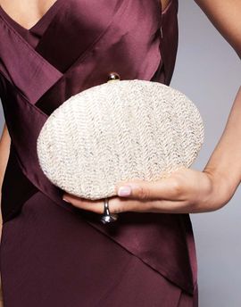 True Decadence True Decadence round structured woven clutch bag in gold metallic