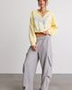 TRUE RELIGION True Religion Glitter Graphic Notch V-Neck Pullover Top in Double Cream, Women's at Urban Outfitters - 2