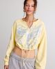 TRUE RELIGION True Religion Glitter Graphic Notch V-Neck Pullover Top in Double Cream, Women's at Urban Outfitters - 3