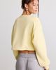 TRUE RELIGION True Religion Glitter Graphic Notch V-Neck Pullover Top in Double Cream, Women's at Urban Outfitters - 4