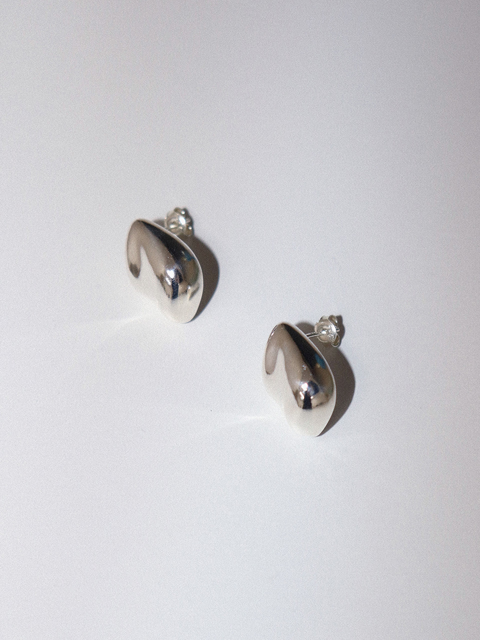 turntable Conch Earring_ Silver