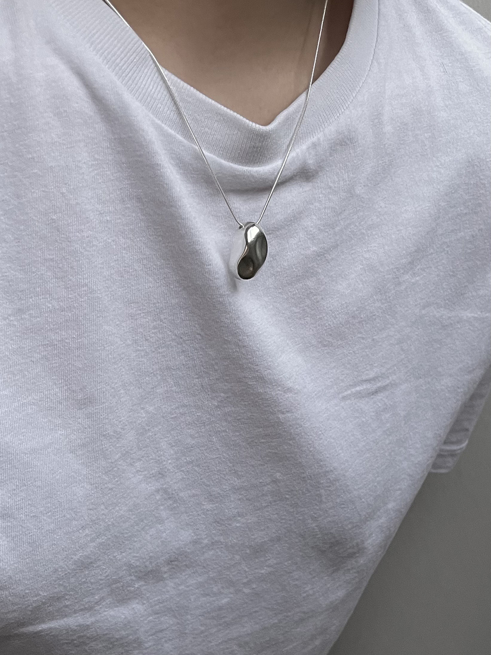 turntable Egg Stone Necklace_ Silver